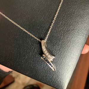 sterling silver necklace w/ black & white diamonds